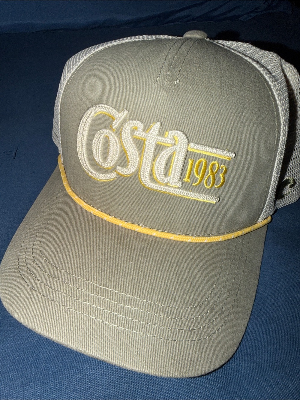 Costa Olive and White Trucker Hat with Yellow Accents